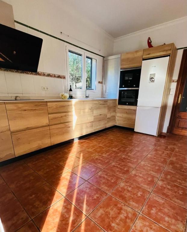 Kuchyň nebo kuchyňský kout v ubytování Villa Paula