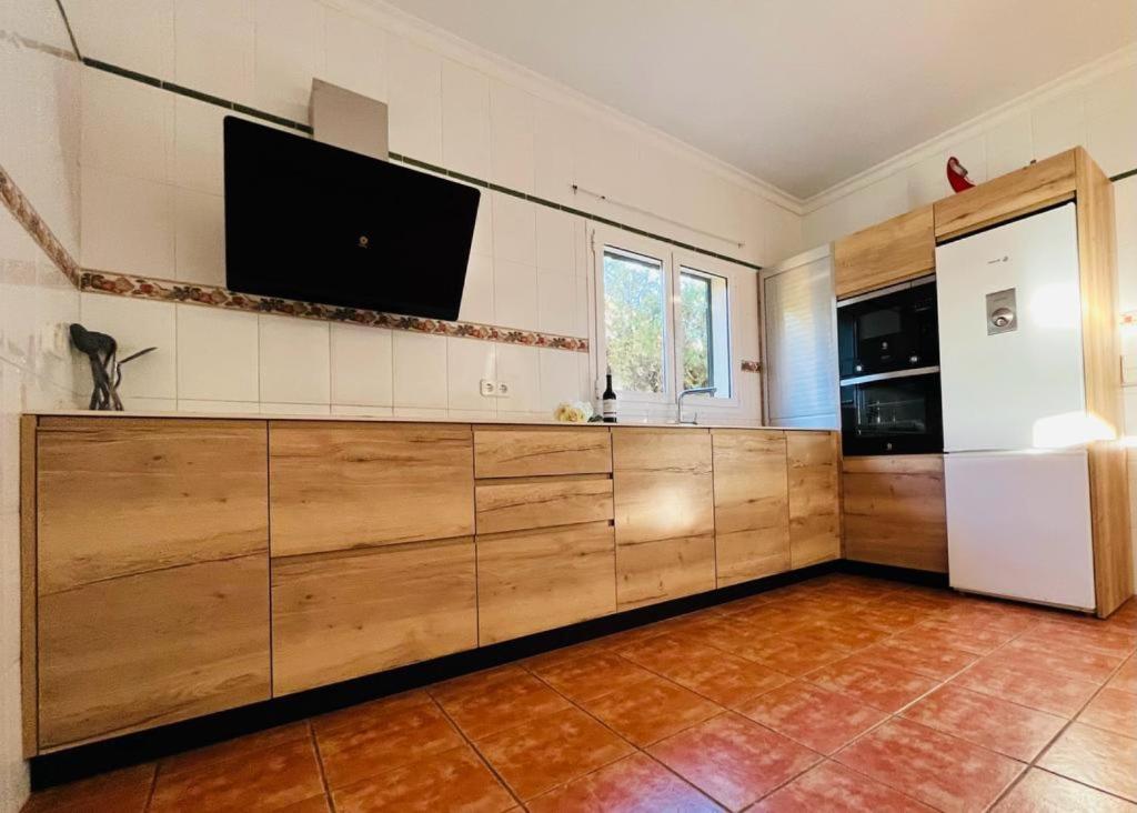 Kuchyň nebo kuchyňský kout v ubytování Villa Paula