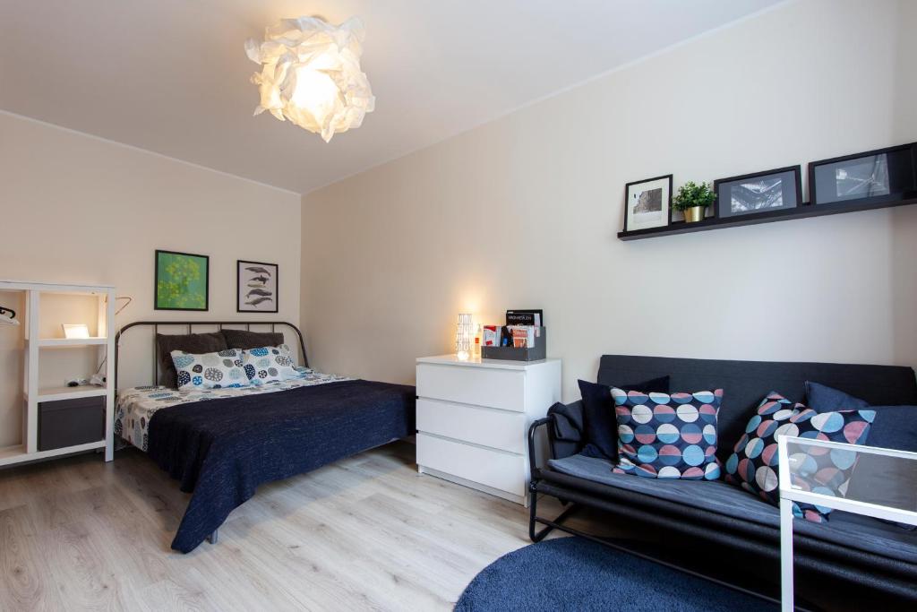Postel nebo postele na pokoji v ubytování Scandinavian style apartment in City Center