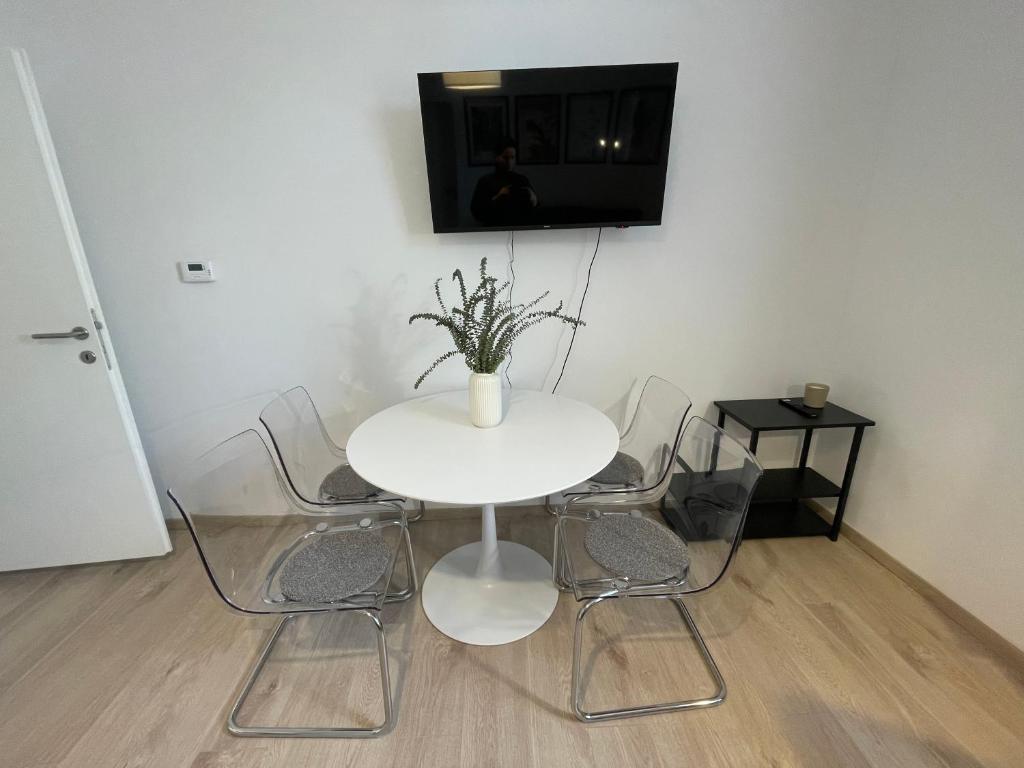 Telewizja i/lub zestaw kina domowego w obiekcie At Home - City Center Zagreb