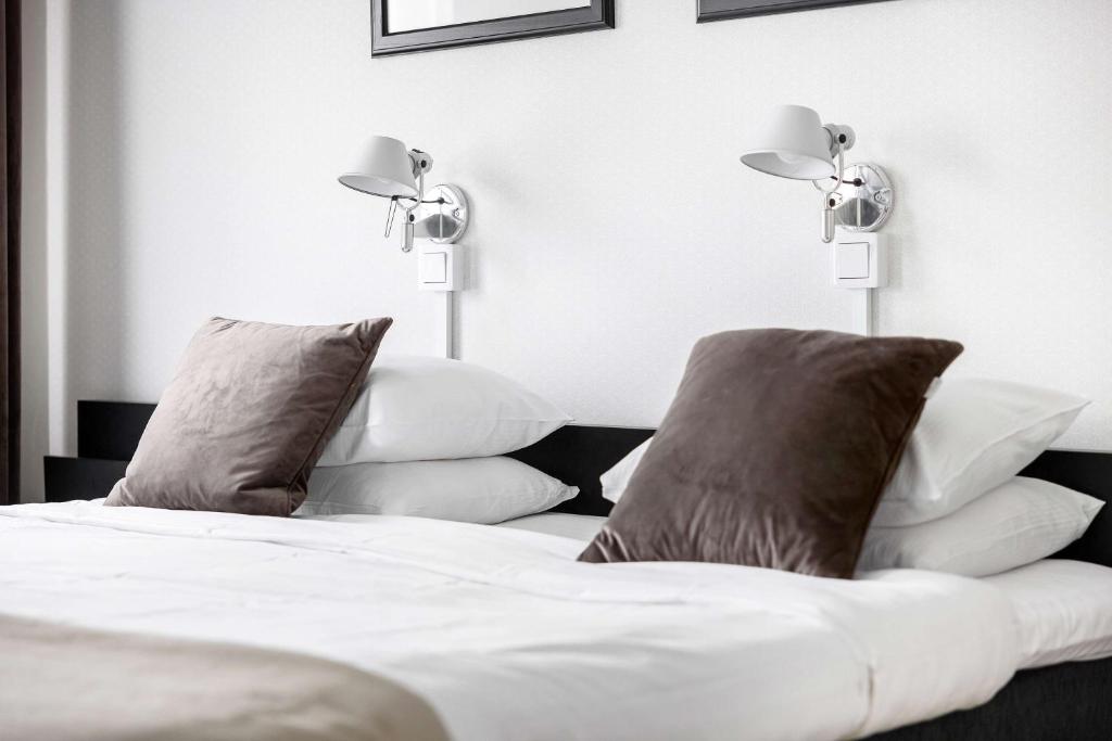 Postel nebo postele na pokoji v ubytování Best Western Hotel Trollhattan