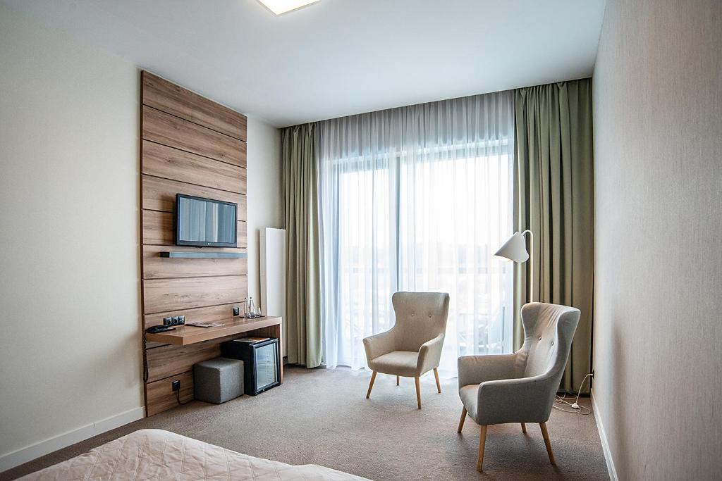 TV a/nebo společenská místnost v ubytování Hotel Bonifacio SPA&SPORT Resort