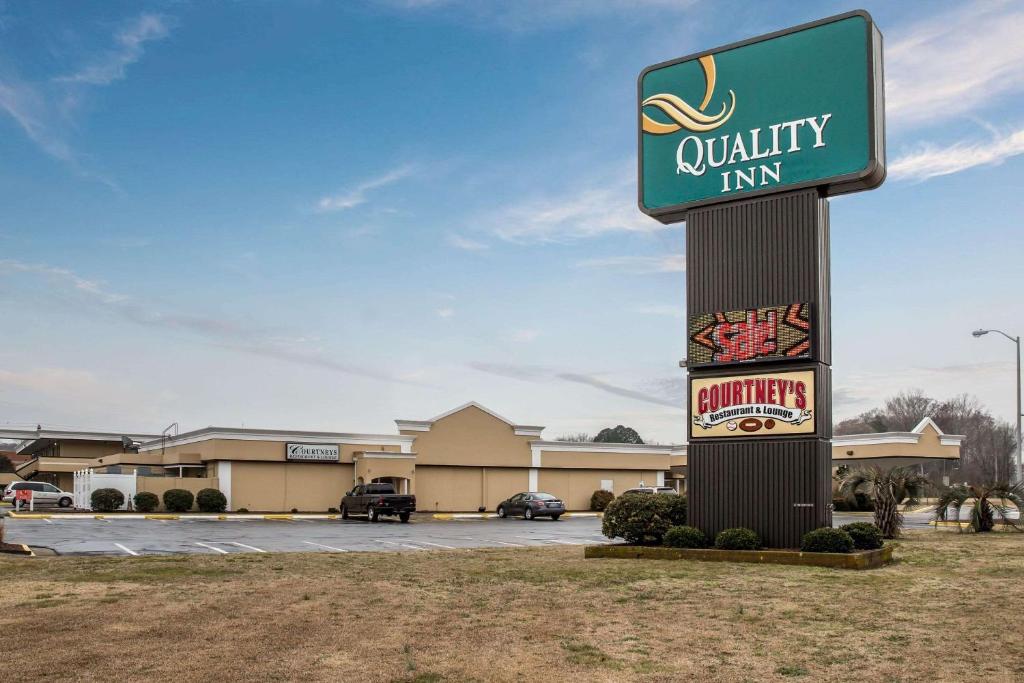 a sign for a quality inn in a parking lot at Quality Inn Elizabeth City near University in Elizabeth City