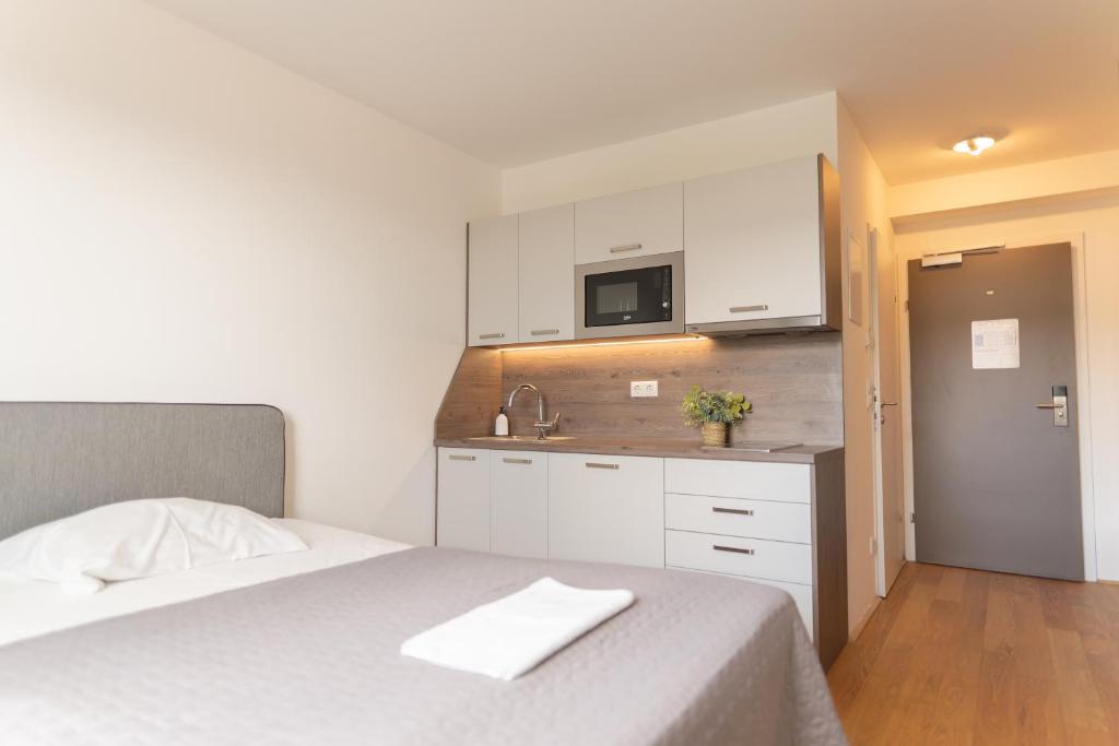 Una cocina o kitchenette en Hotel Triester