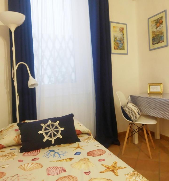 Postel nebo postele na pokoji v ubytování B&B La Casa in Centro
