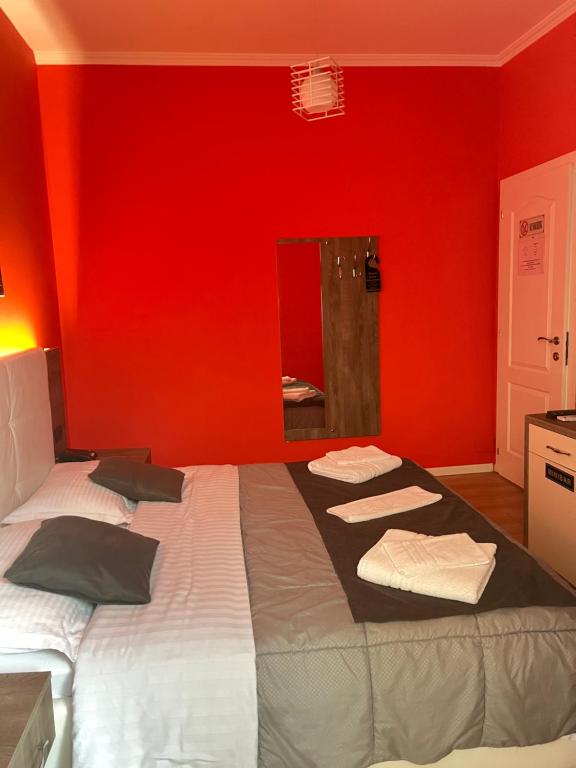 Postel nebo postele na pokoji v ubytování MARION HOTEL
