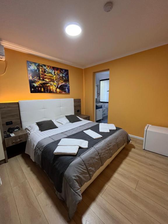 Postel nebo postele na pokoji v ubytování MARION HOTEL