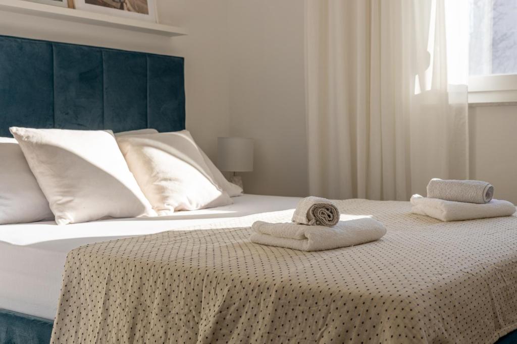 Posteľ alebo postele v izbe v ubytovaní Apartment with terrace and parking near beach