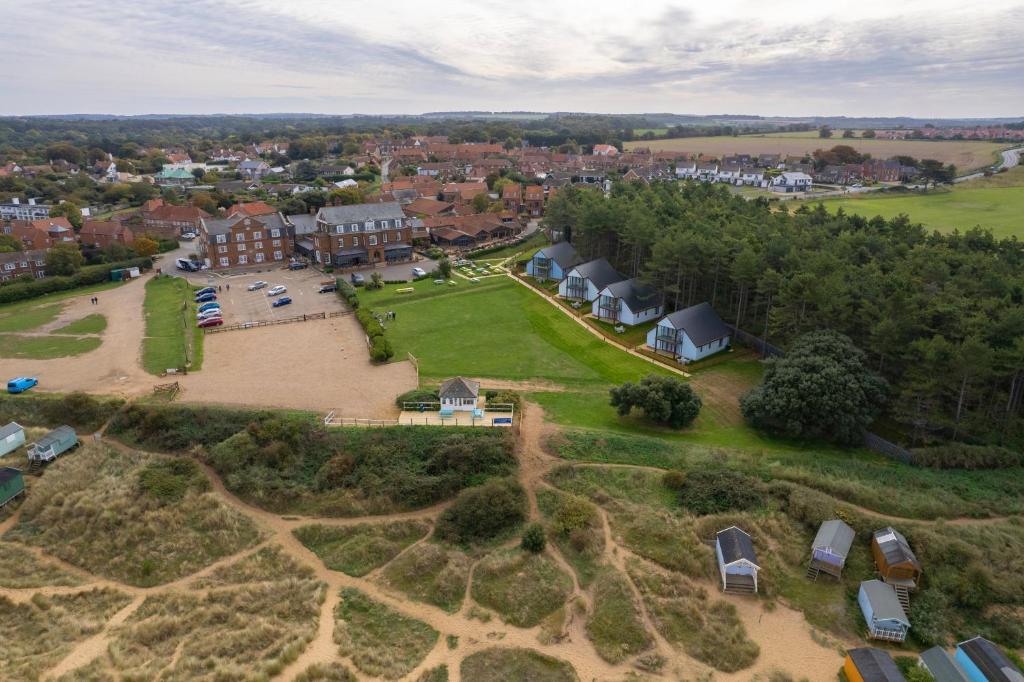 an aerial view of a large estate with houses at Old Hunstanton Le Strange Arms Hotel in Hunstanton