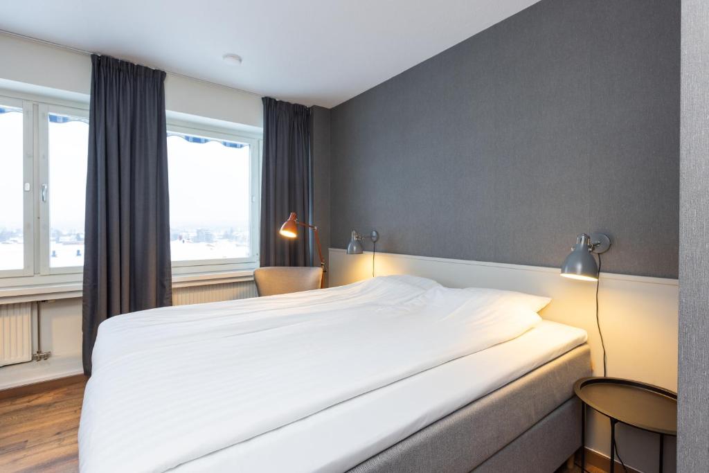 Postel nebo postele na pokoji v ubytování Hotel Victoria