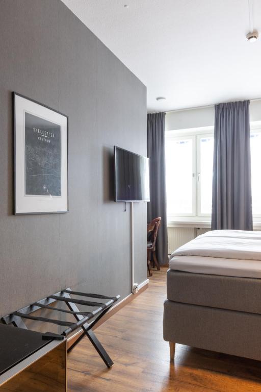 Postel nebo postele na pokoji v ubytování Hotel Victoria
