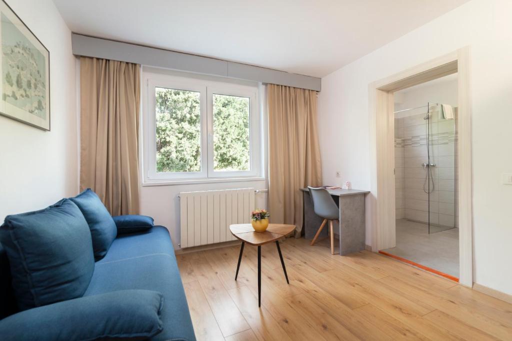 Predel za sedenje v nastanitvi Boarding House Lucija