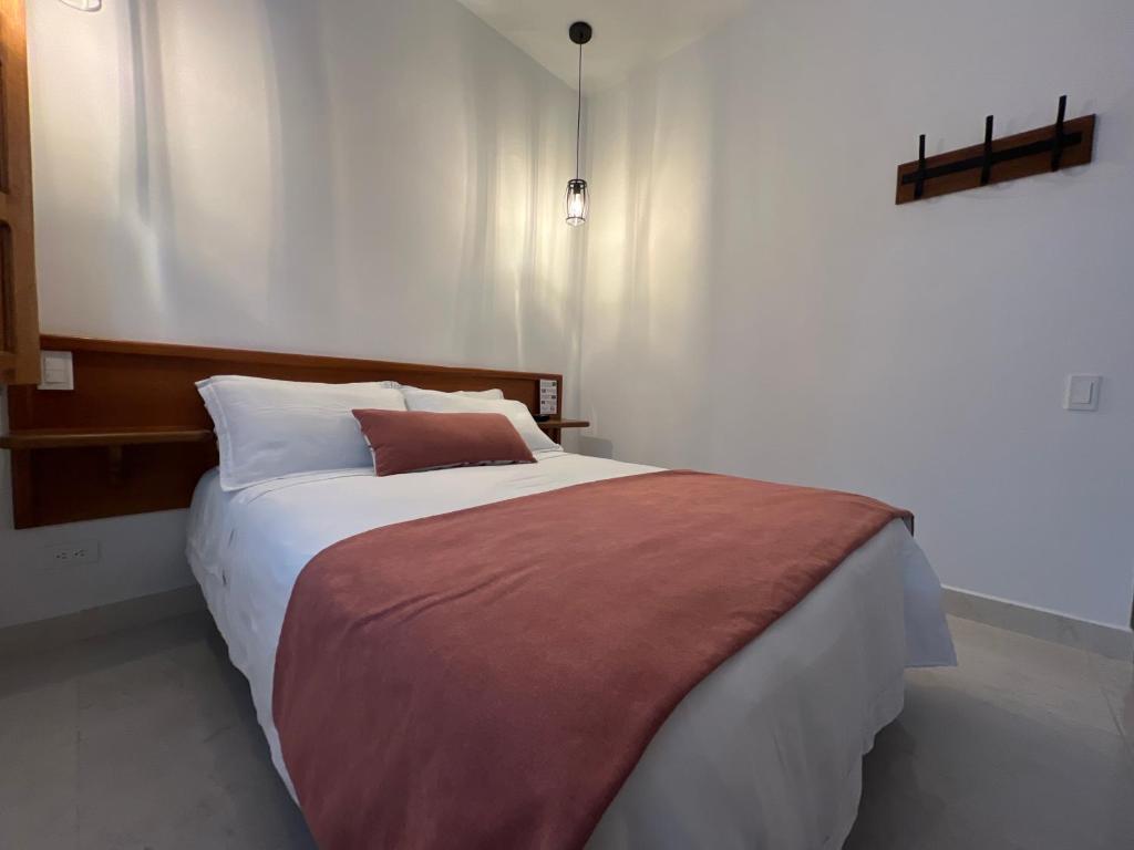 Postel nebo postele na pokoji v ubytování Casa Isabel Hotel