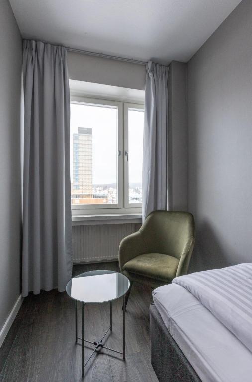Postel nebo postele na pokoji v ubytování Hotel Victoria