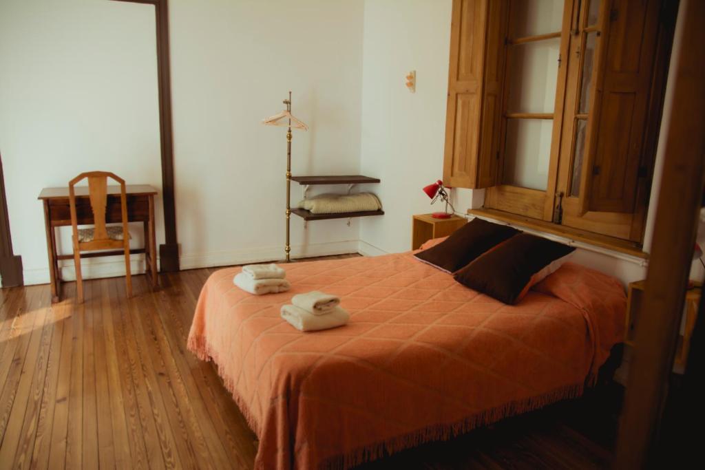 Кровать или кровати в номере Portón Rojo