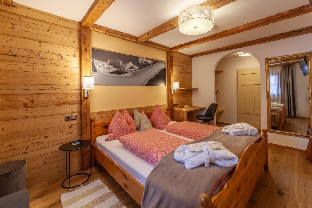 Postel nebo postele na pokoji v ubytování Hotel Berger Superior