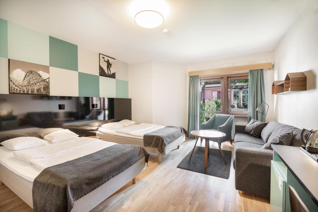 Postel nebo postele na pokoji v ubytování Hotell Heden - BW Signature Collection