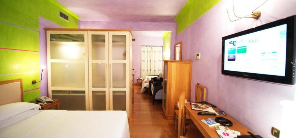 TV a/nebo společenská místnost v ubytování Hotel Firenze