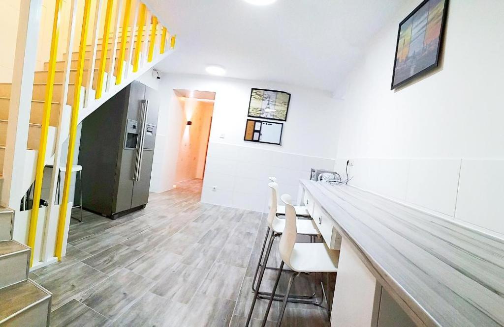 Una televisión o centro de entretenimiento en Smart Mini Hotel