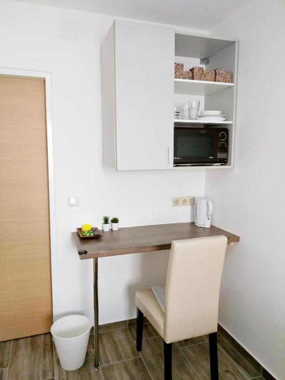 Una cocina o kitchenette en Smart Mini Hotel