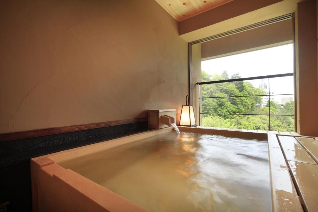 Fotografie z fotogalerie ubytování Shikanoyu Hotel v destinaci Komono