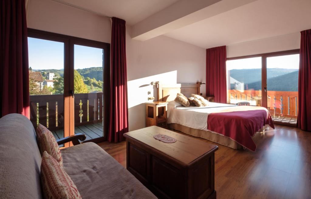 Postel nebo postele na pokoji v ubytování Hotel Calitxo