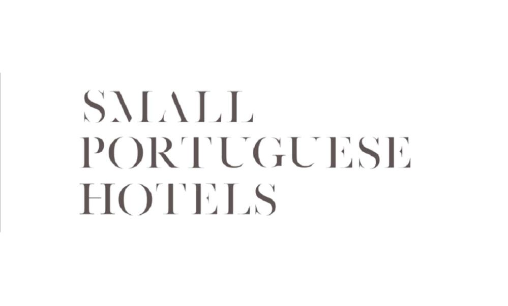 a handwritten font with the words small punctuated hotels at RM The Experience - Small Portuguese Hotels in Setúbal