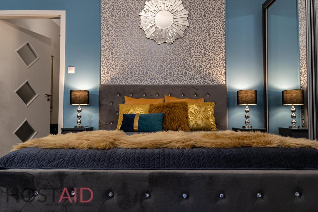 Posteľ alebo postele v izbe v ubytovaní V68 Design Apartment - hostAID