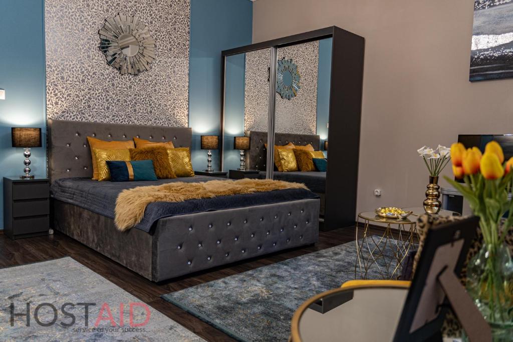 Posteľ alebo postele v izbe v ubytovaní V68 Design Apartment - hostAID