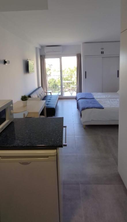 Łóżko lub łóżka w pokoju w obiekcie Estudio Minerva 429, Costa del Sol