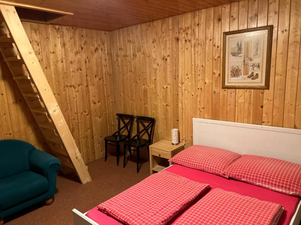 Postel nebo postele na pokoji v ubytování Kamenný Mlýn