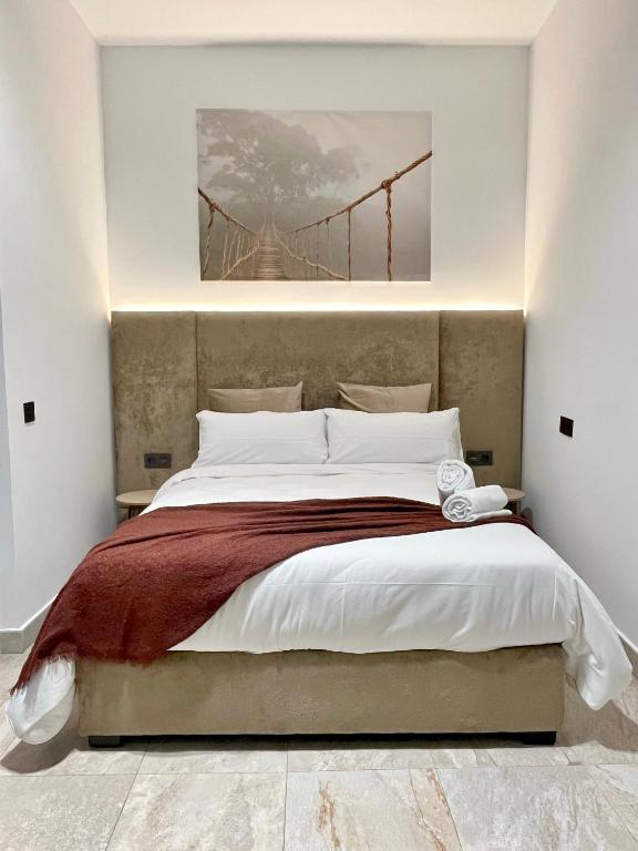 Posteľ alebo postele v izbe v ubytovaní Tennessee Urban Suites