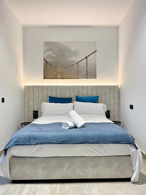 Posteľ alebo postele v izbe v ubytovaní Tennessee Urban Suites