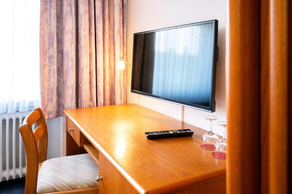 TV a/nebo společenská místnost v ubytování Hotel Am Steinberg
