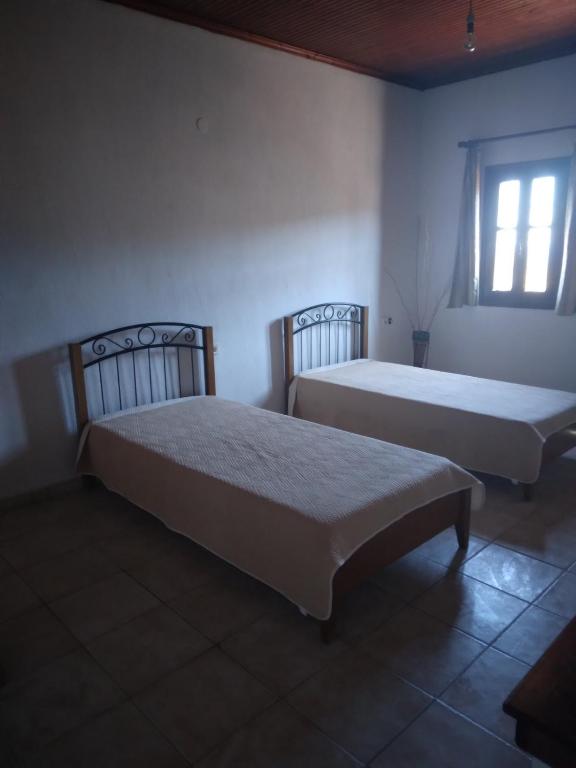 Postel nebo postele na pokoji v ubytování Villa Gialos Ηλέκτρα