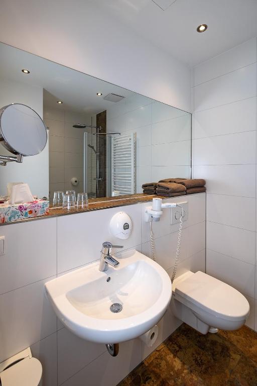 Koupelna v ubytování Hotel Am Steinberg