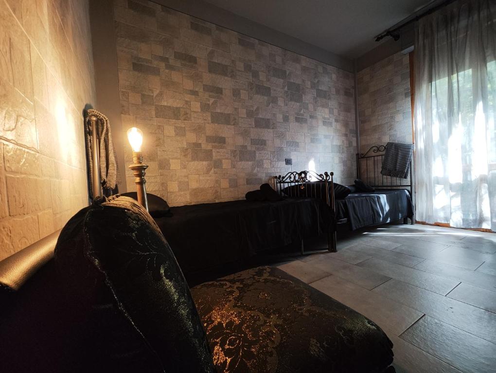 A bed or beds in a room at Hotel Transilvania