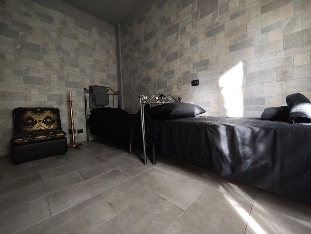 A bed or beds in a room at Hotel Transilvania