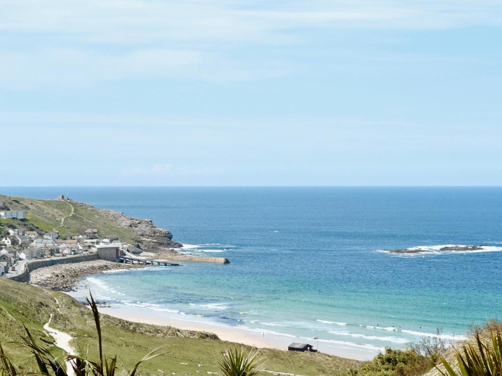 a view of a beach with the ocean at Bowji in St. Just