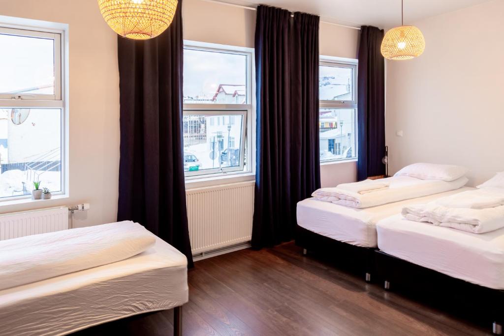 Voodi või voodid majutusasutuse Westman Islands Inn toas