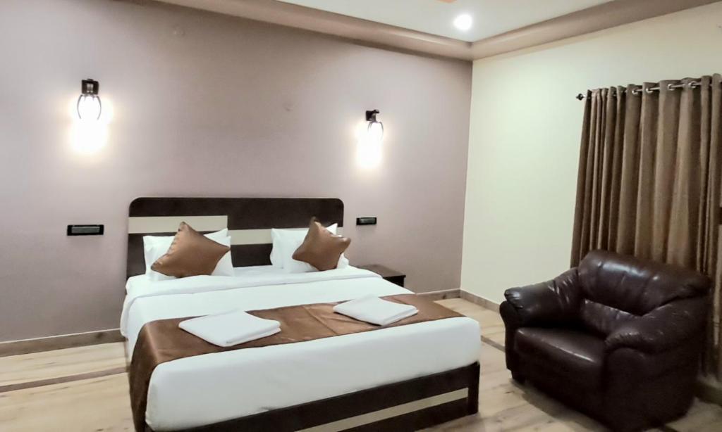 Postel nebo postele na pokoji v ubytování IHotels Yercaud