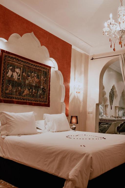 Postel nebo postele na pokoji v ubytování Demeures d'Orient Riad & Spa