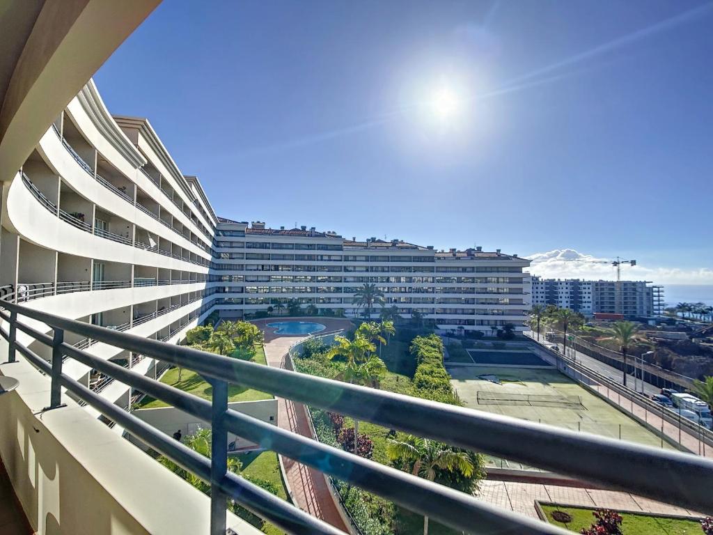 a view of a building from a balcony at Monumental Ocean View by Atlantic Holiday in Funchal