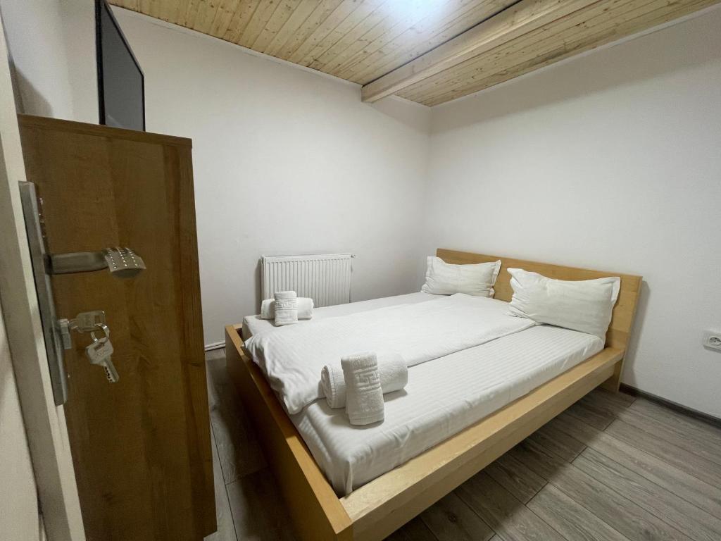 Postel nebo postele na pokoji v ubytování Vila Rustik Straja