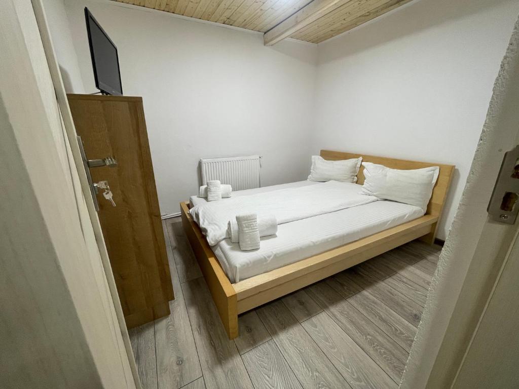 Postel nebo postele na pokoji v ubytování Vila Rustik Straja