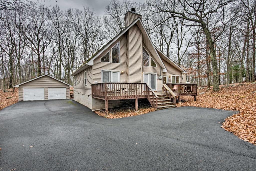 a large house with a porch and a driveway at Lackawaxen Family Home with Lake Access! in Lackawaxen