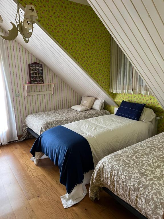 Postel nebo postele na pokoji v ubytování Casa Santiago