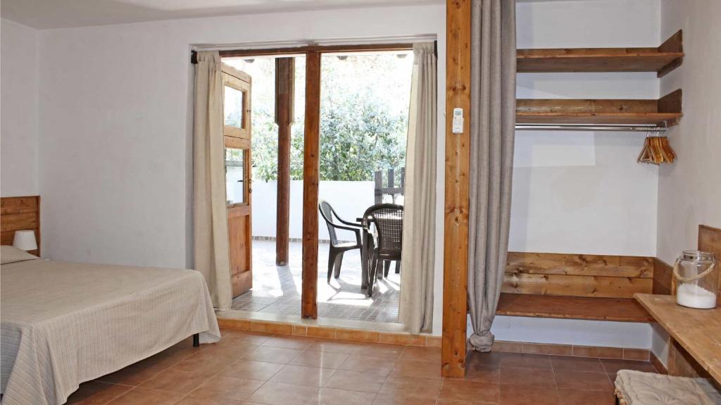 Postel nebo postele na pokoji v ubytování Villaggio Camping Sentinella