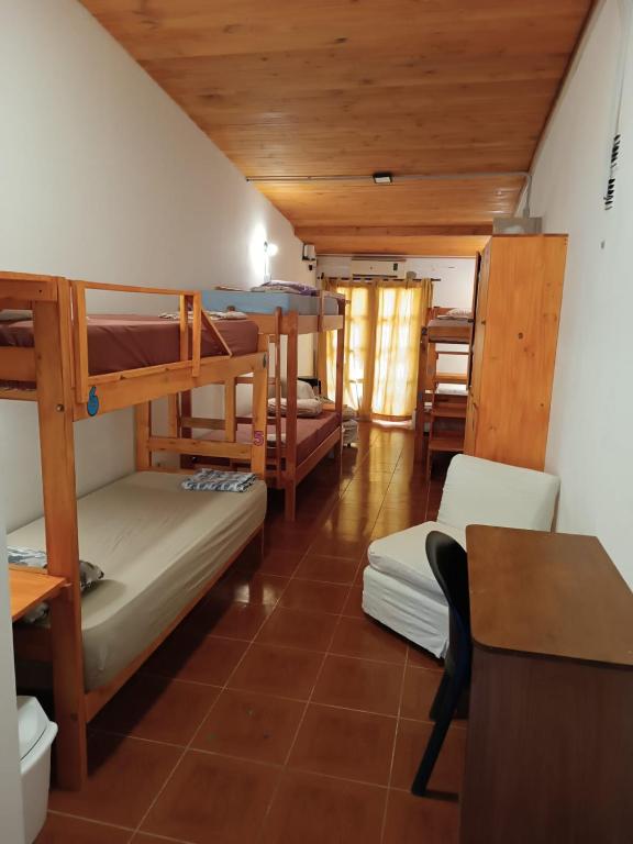 Postel nebo postele na pokoji v ubytování Cataratas Jazz Hostel