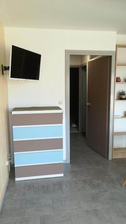 Fotografia z galérie ubytovania Beau studio cabine avec balcon, vue piscine, parking privé, climatisation, solarium, laverie v destinácii Cap d'Agde